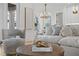 Stylish coffee table with books and decor in the living room at 4835 W San Jose St, Tampa, FL 33629