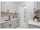 Laundry room with built-in cabinets and countertop space at 4835 W San Jose St, Tampa, FL 33629