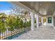 Spacious patio with pool and surrounding greenery at 4835 W San Jose St, Tampa, FL 33629