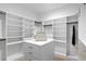 Large walk-in closet with ample shelving and hanging space at 4835 W San Jose St, Tampa, FL 33629
