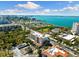 Aerial view showcasing the building's location near the water at 1188 N Tamiami Trl # 201, Sarasota, FL 34236