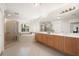 Elegant bathroom featuring double sinks and a large shower at 1188 N Tamiami Trl # 201, Sarasota, FL 34236