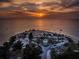 Aerial view of beach park at sunset, showing parking and gazebo at 1619 Coppertree Dr, Tarpon Springs, FL 34689