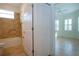 Clean bathroom with tub, shower, and tile flooring at 649 Chipper Dr, Sun City Center, FL 33573