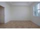 Empty bedroom featuring tile floors and white walls at 649 Chipper Dr, Sun City Center, FL 33573