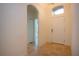 Light-filled entryway with tile flooring and access to other rooms at 649 Chipper Dr, Sun City Center, FL 33573