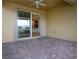 Screened patio with brick flooring and access to the house at 649 Chipper Dr, Sun City Center, FL 33573