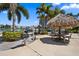 Enjoy grilling under a tiki hut in this waterfront community at 7625 Sun Island S Dr # 101, South Pasadena, FL 33707