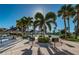 Community BBQ area with multiple grills and picnic tables at 7625 Sun Island S Dr # 101, South Pasadena, FL 33707