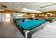 Relaxing billiard room with multiple pool tables at 7625 Sun Island S Dr # 101, South Pasadena, FL 33707