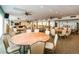 Spacious community room with tables and chairs at 7625 Sun Island S Dr # 101, South Pasadena, FL 33707