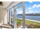 Enclosed patio with water views, ideal for relaxation at 7625 Sun Island S Dr # 101, South Pasadena, FL 33707