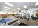 Fitness center featuring treadmills, ellipticals, and weights at 7625 Sun Island S Dr # 101, South Pasadena, FL 33707