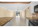 Open floor plan with view of living room and water access at 7625 Sun Island S Dr # 101, South Pasadena, FL 33707