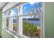 Spacious window offers stunning water views from inside the condo at 7625 Sun Island S Dr # 101, South Pasadena, FL 33707