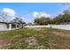 House backyard with a large, grassy area at 8816 Ashman Rd, Riverview, FL 33578