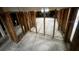 Unfinished basement with exposed framing and concrete floor at 200 Country Club Dr # 1503, Largo, FL 33771