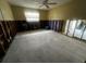 A gutted bedroom, ready for renovation, with exposed framing at 200 Country Club Dr # 1503, Largo, FL 33771