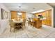 Kitchen dining area with light wood table and chairs at 2353 Kilgore Dr, Largo, FL 33770