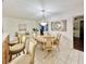 Bright dining room with wood table and chairs near kitchen at 2353 Kilgore Dr, Largo, FL 33770