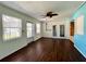 Bright living room featuring wood-look floors and sliding glass doors at 2353 Kilgore Dr, Largo, FL 33770