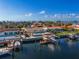 Bird's-eye view of a canal-front home, pool, and private dock at 4380 44Th S St, St Petersburg, FL 33711