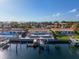 Aerial view showcasing a waterfront home with private pool and dock at 4380 44Th S St, St Petersburg, FL 33711