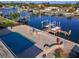 Elevated view of a refreshing pool and spacious patio overlooking a canal at 4380 44Th S St, St Petersburg, FL 33711