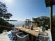 Relaxing outdoor dining area on a private waterfront dock at 25 S Treasure Dr, Tampa, FL 33609