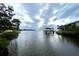 Stunning waterfront view with a private dock and gazebo at 25 S Treasure Dr, Tampa, FL 33609