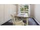 Bright dining room with white wainscoting and a farmhouse table at 3407 Fox Squirrel Ln, Valrico, FL 33594