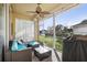 Relaxing screened lanai with outdoor furniture at 3407 Fox Squirrel Ln, Valrico, FL 33594