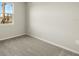 Well-lit bedroom with carpet flooring and a window at 6092 Timberdale Ave, Wesley Chapel, FL 33545