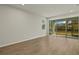 Bright living area with sliding doors leading to a patio at 6092 Timberdale Ave, Wesley Chapel, FL 33545