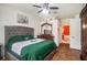 Spacious bedroom with wood floors and en-suite bathroom at 6232 French Creek Ct, Ellenton, FL 34222