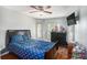 Bedroom with wood floors and nautical-themed bedding at 6232 French Creek Ct, Ellenton, FL 34222