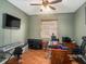 Home office featuring a large desk and entertainment center at 6232 French Creek Ct, Ellenton, FL 34222