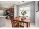 Kitchen with breakfast nook and dark wood cabinets at 6232 French Creek Ct, Ellenton, FL 34222