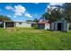 Large backyard with shed and plenty of space for outdoor activities at 6382 81St N Ave, Pinellas Park, FL 33781