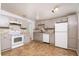 Well-lit kitchen featuring gray cabinetry, modern backsplash, and newer appliances at 6382 81St N Ave, Pinellas Park, FL 33781