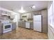 Well-lit kitchen featuring gray cabinetry, modern backsplash, and newer appliances at 6382 81St N Ave, Pinellas Park, FL 33781