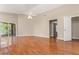 Large main bedroom with hardwood floors and access to patio at 27542 Sky Lake Circle, Wesley Chapel, FL 33544