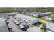 Aerial view of community featuring multiple buildings, parking and landscaping at 5875 21St N St # 15L, St Petersburg, FL 33714