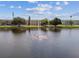 Peaceful lakefront view of community at 5875 21St N St # 15L, St Petersburg, FL 33714
