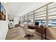 Home office with built-in desk and large windows overlooking water view at 5875 21St N St # 15L, St Petersburg, FL 33714