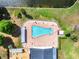 Inviting community pool with plenty of lounge chairs at 5875 21St N St # 15L, St Petersburg, FL 33714