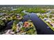 Bird's-eye view of waterfront home and surrounding neighborhood at 853 Seacrest Dr, Largo, FL 33771