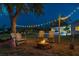 Inviting backyard with firepit and string lights perfect for relaxing evenings at 853 Seacrest Dr, Largo, FL 33771