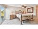 Bedroom with wooden frame bed and water view at 853 Seacrest Dr, Largo, FL 33771