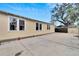 Large concrete patio area adjacent to home at 2905 N 13Th St, Tampa, FL 33605